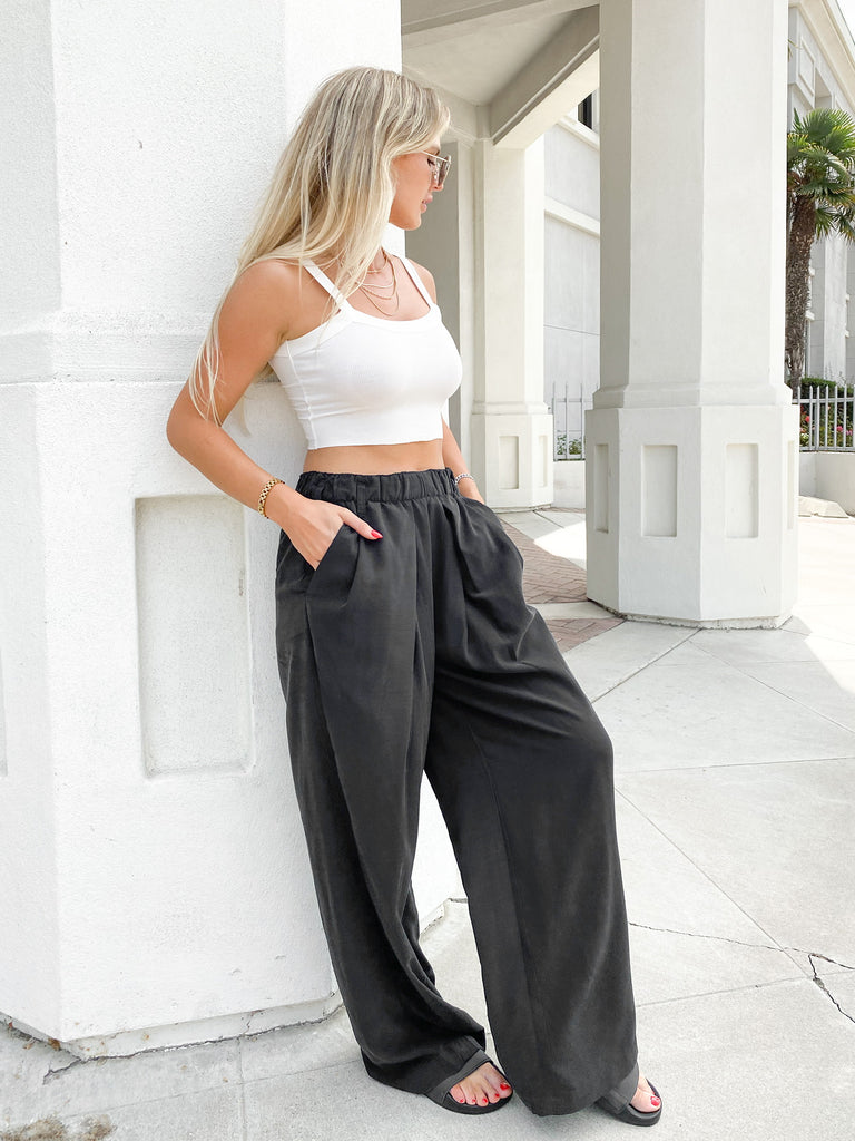 Nothing to Say Pleated Trouser in Black by FREE PEOPLE