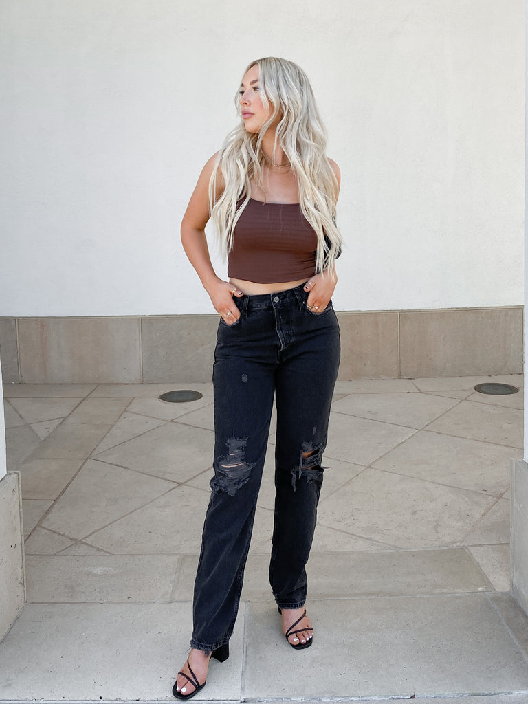 The Lasso Jean in Washed Black by FREE PEOPLE